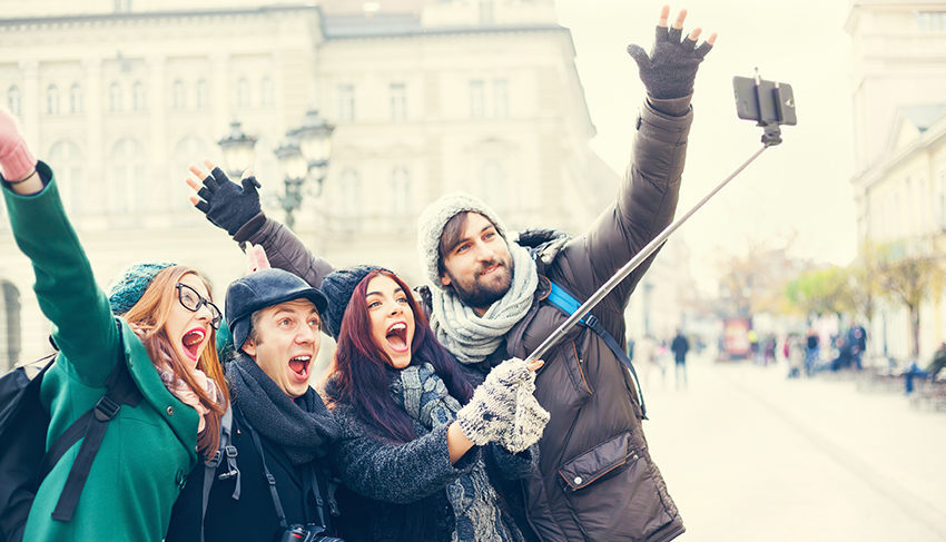Group Of Tourists Taking Selfie